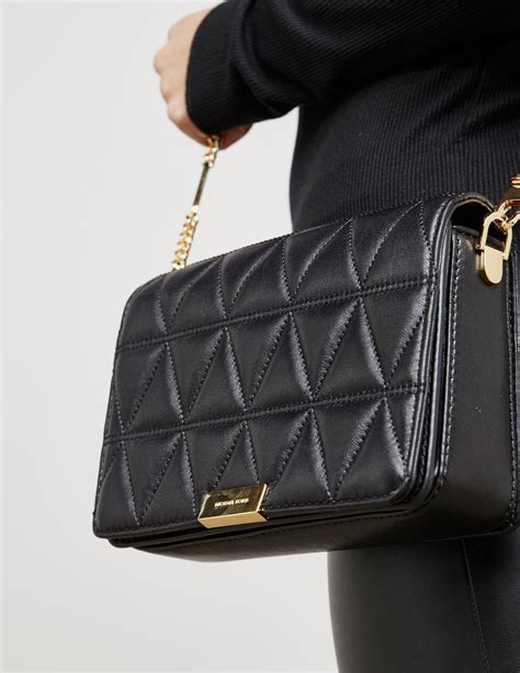 michael kors black and gold clutch bag|Michael Kors clutch outlet.